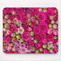 Tapis de souris assez rose d'image de fleur