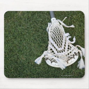 Tapis De Souris Bâton de lacrosse sur l'herbe
