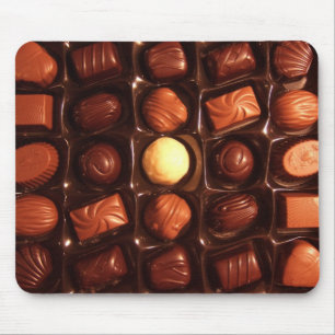 Tapis de souris de motif de chocolat de plaisirs