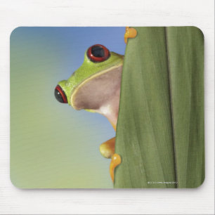 Tapis De Souris Grenouille rouge Tre Peeking de derrière une feuil