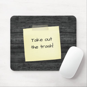 Tapis De Souris Note Tapée Sur Le Bois
