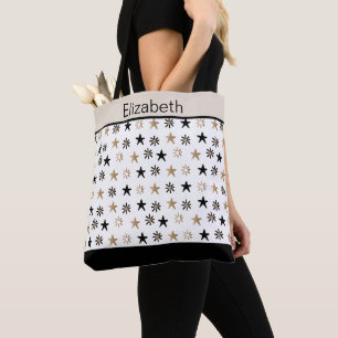 Tasche mit schwarzen und goldenen Sternen und Mono