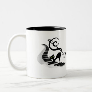 Tasse 2 Couleurs Chat sur un clavier de piano jouant de la musique 