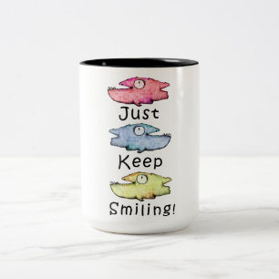 Tasse 2 Couleurs Continuez à sourire ! Des poissons dentus colorés