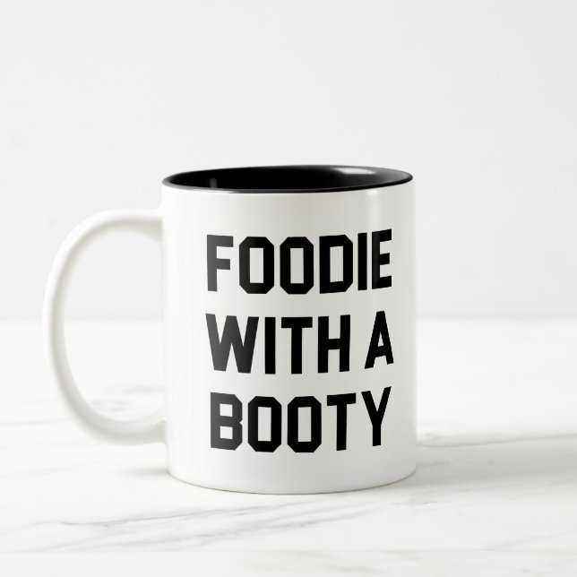 Tasse 2 Couleurs Fin gourmet avec un butin (Gauche)