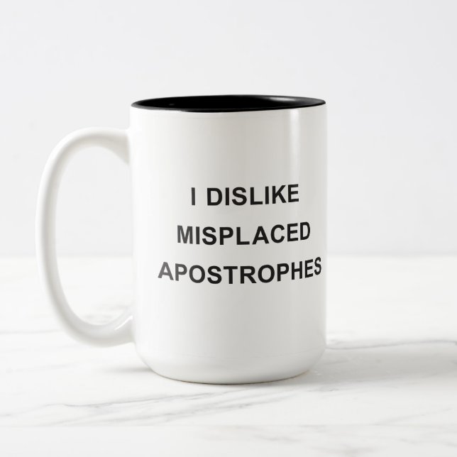 Tasse 2 Couleurs Je déteste des apostrophes mal placées (Gauche)