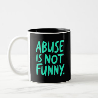 Tasse 2 Couleurs L'abus n'est pas drôle