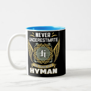 Tasse 2 Couleurs Ne sous-estimez jamais le pouvoir d'un Hyman