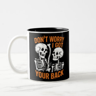 Tasse 2 Couleurs Squelette Ne t'inquiète pas, j'ai ton dos Hallowee