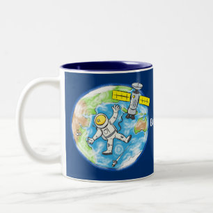 Tasse 2 Couleurs Un astronaute amusant dans l'espace et la bande de