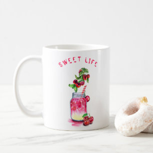 Tasse à café avec cocktail de cerise