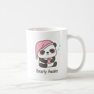 Tasse à café avec un ours panda mignon endormi et 