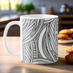 Tasse à café moderne noir et blanc avec des tourbi