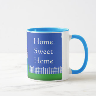 Tasse à la maison douce à la maison