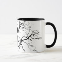 Arbre sans feuilles en silhouette d'hiver