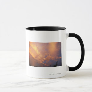 Tasse Arrangement de Sun derrière des nuages