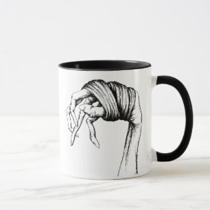 Tasse attachée de mains