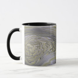 Tasse aus flüssigem Gold
