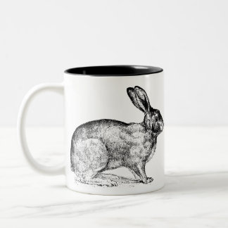Tasse aus schwarzem und weißem Kaninchen