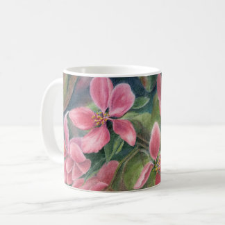 Tasse avec des fleurs d'Apple