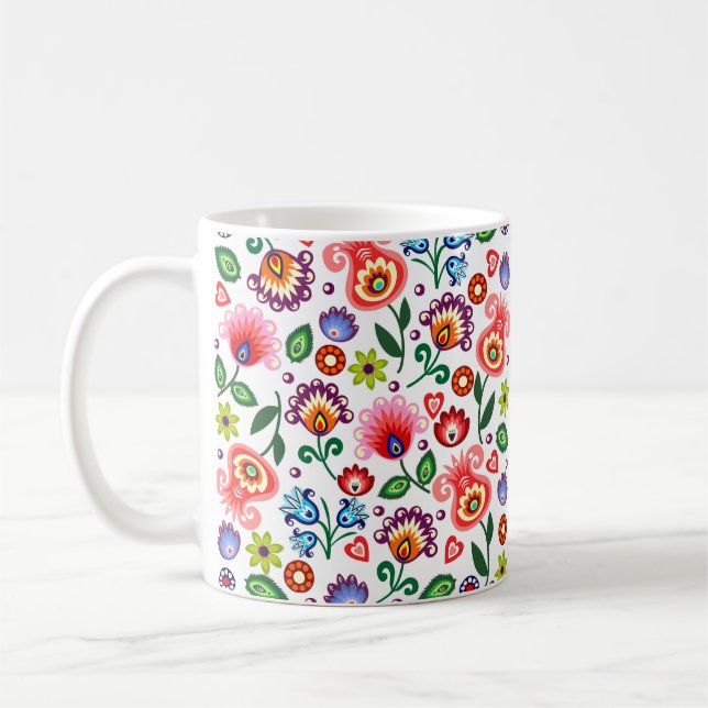 tasse avec les gens polonais de motif (Gauche)