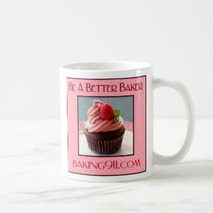 Tasse blanche du petit gâteau Baking911