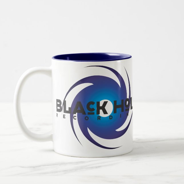 Tasse bleue de base d'enregistrements de trou noir (Gauche)
