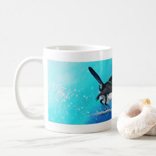 Tasse bleue de beaux-arts de roitelet