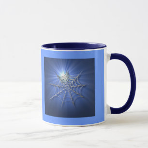 Tasse bleue de toile d'araignée de rayon de solei