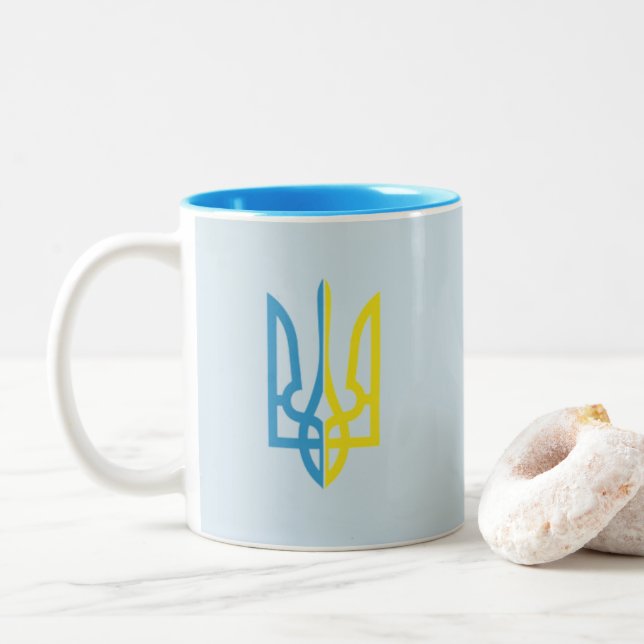 Tasse bleue/jaune ukrainienne de Tryzub (Avec donut)
