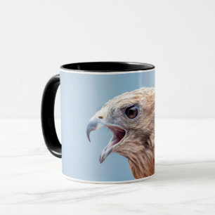 Tasse Buse à épaulettes rouge sur un rocher