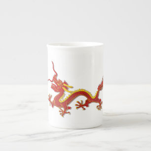 Tasse chinoise de spécialité de dragon de rouge et
