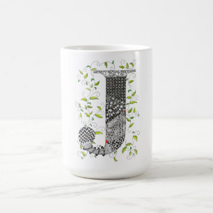 Tasse colorée de la lettre J de monogramme