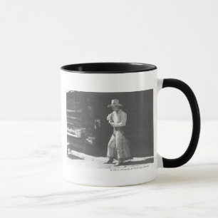 Tasse Cowboy mangeant d'un beurre d'arachide Can. de