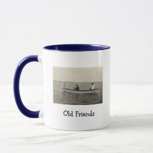Tasse de café avec ancienne photo de voileurs Amis