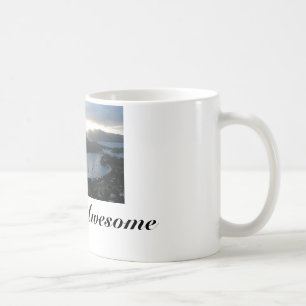 Tasse de café avec la plage impressionnante de