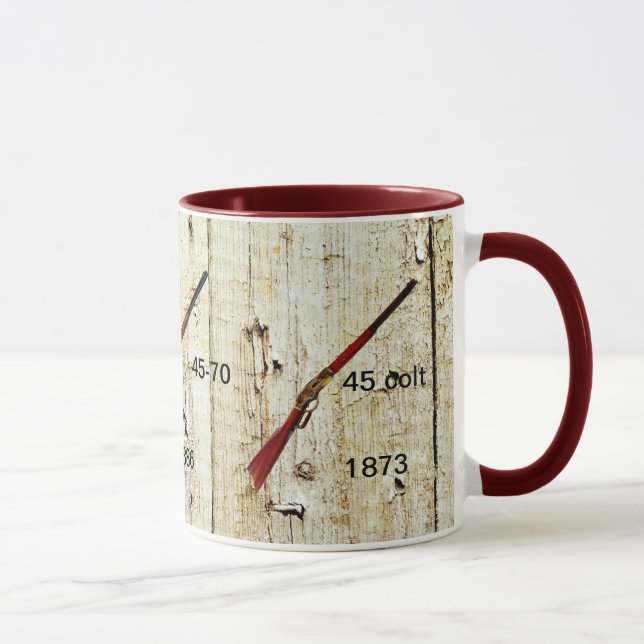 Tasse de café avec les fusils qui ont gagné (Droite)