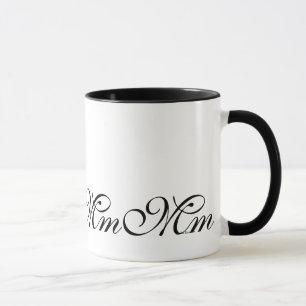 Tasse de café élégante de l'initiale M de