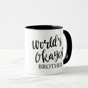 Tasse de café noire et blanche de frère d'Okayes