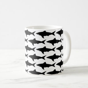 Tasse de café noire et blanche de motif de