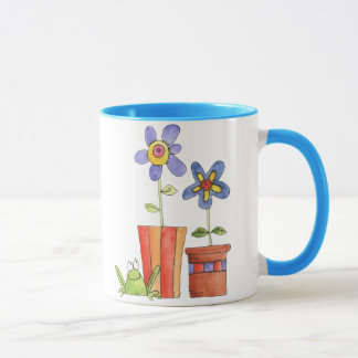 Tasse de fleur et de grenouille