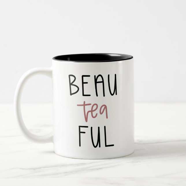 Tasse de ful de thé de beau belle (Gauche)