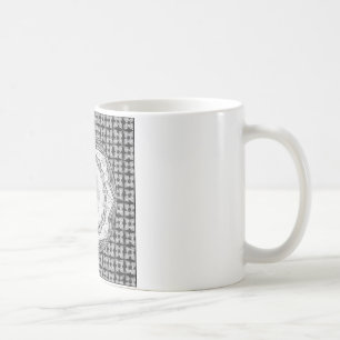 Tasse de houx et de flocon de neige