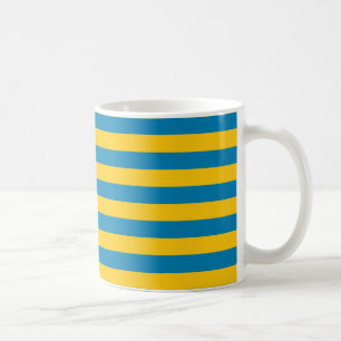Tasse de rayures de bleu et d'or