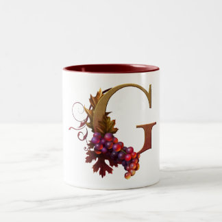 Tasse décorée d'un monogramme "G " du "ARS