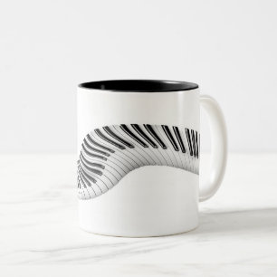 Tasse der abstrakten Klaviertasten