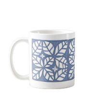 Tasse der Blauen und weißen Blätter