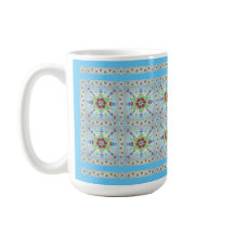Tasse der farbenfrohen Blumenmuster