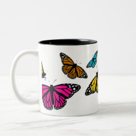 Tasse der farbenfrohen Schmetterlinge