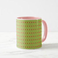 Tasse der grünen und roten Polka-Dots